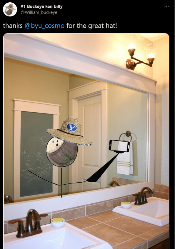 A screenshot of a tweet by @William_buckeye featuring a picture of a bathroom with a stick figure drawn on the window